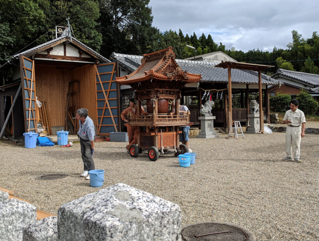 Traveling shrine being prepared for ceremony