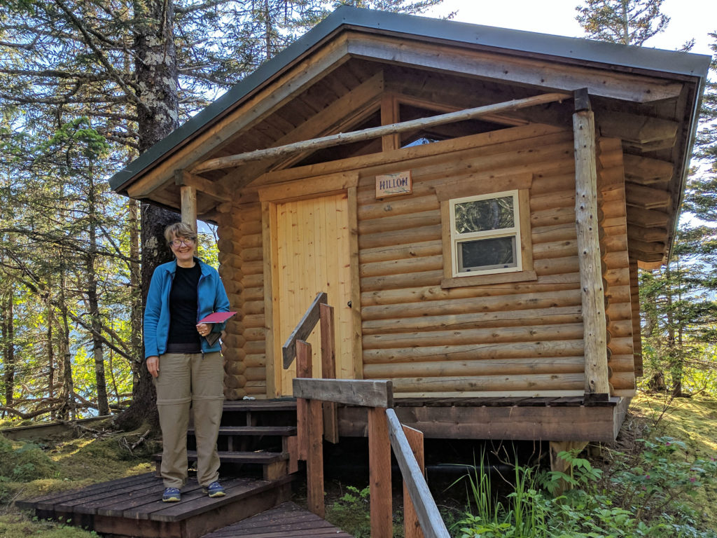 Jan at cabin at Glacier Lodge